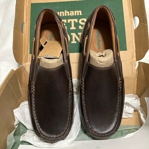 Men’s Dunham slip on shoes. Never worn - size 10W. Dark brown.